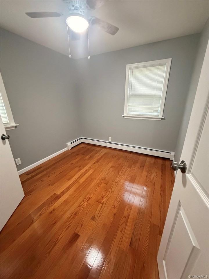 14715 225th St #2ndFL - Photo 6 of 12