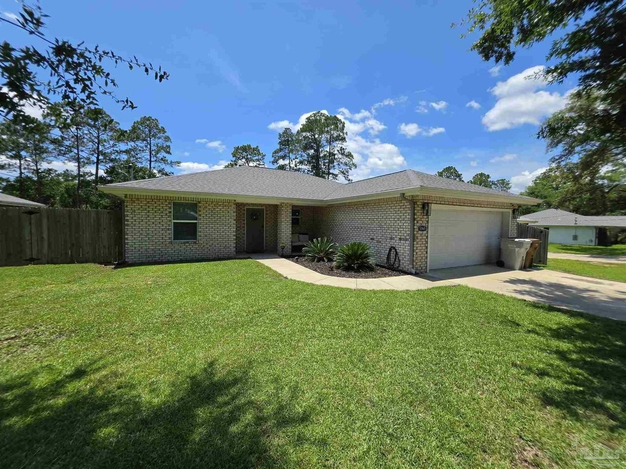 5565 Riviera Dr - Photo 3 of 22