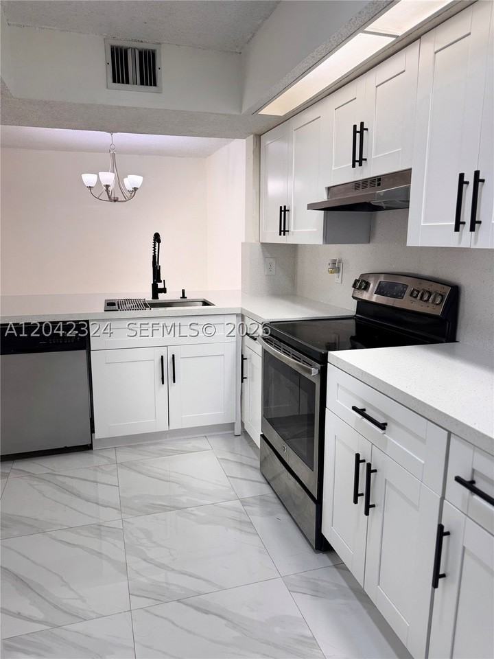 18830 Nw 57th Ave #106 - Photo 2 of 8