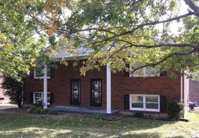 featured image of 404 Whispering Hills Dr