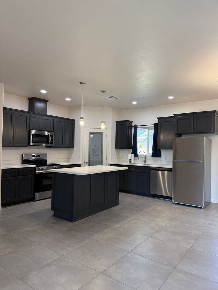 12682 E 50th Ln - Photo 3 of 21