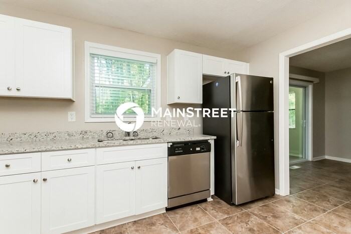 6076 Cowan Mill Rd - Photo 4 of 15