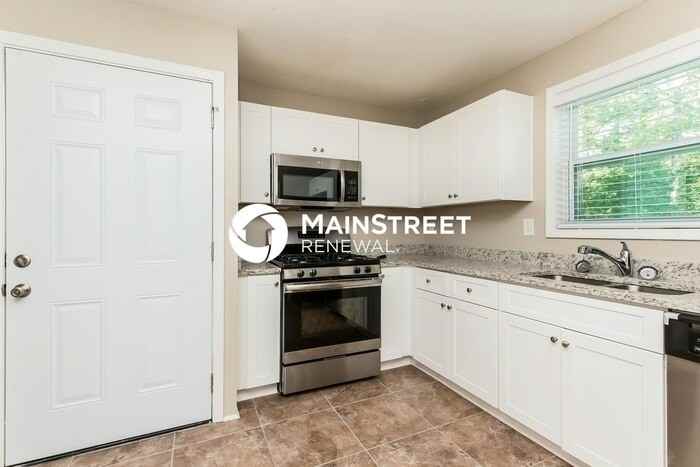 6076 Cowan Mill Rd - Photo 5 of 15