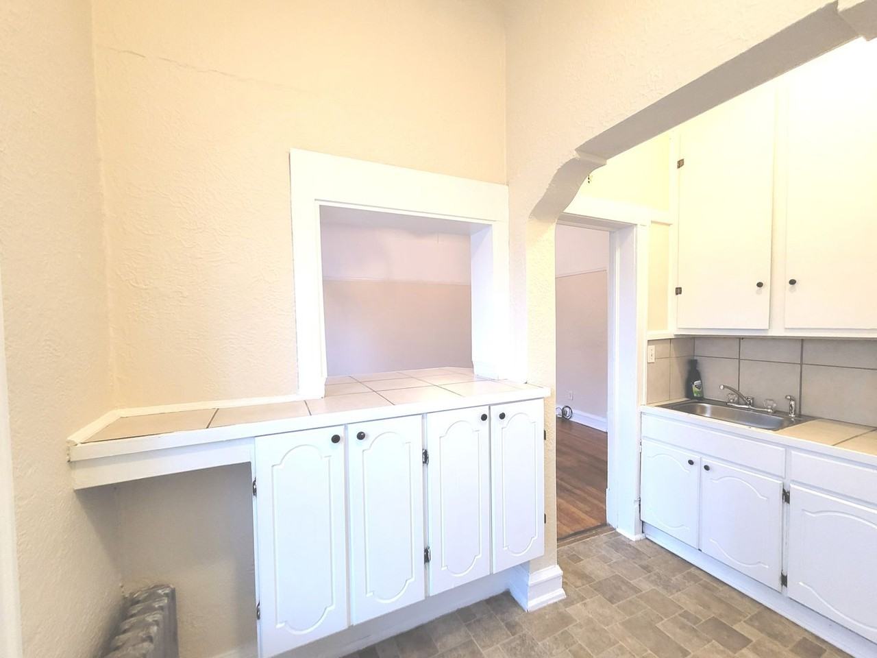 Kane Place Apartments - Photo 7 of 36