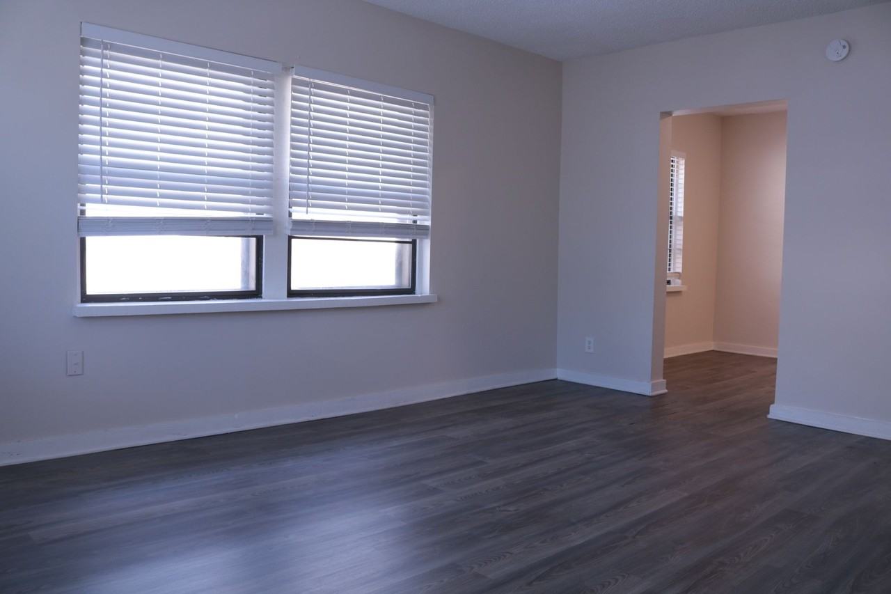 Charming & Updated | Spacious Layouts Near KCAI & UMKC in historic Hyde Park - Photo 2 of 15
