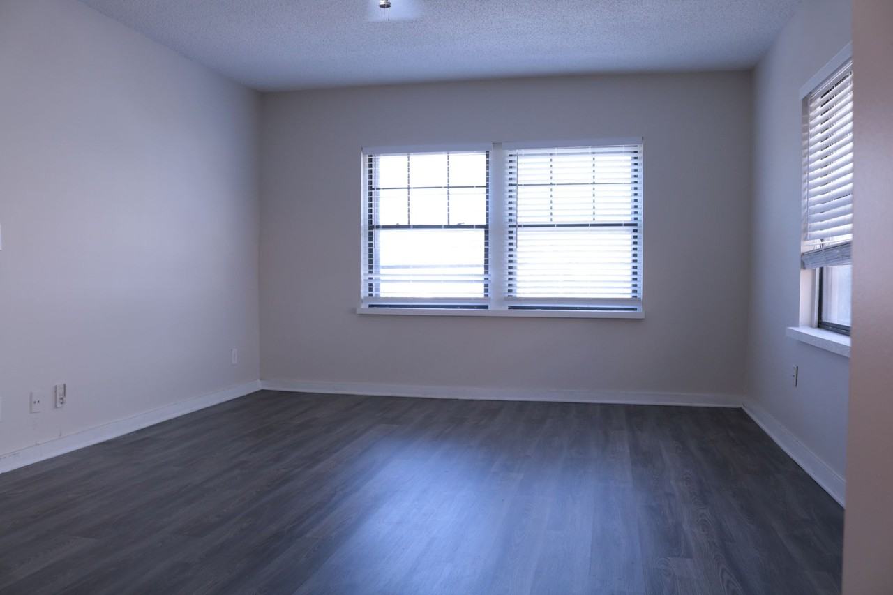 Charming & Updated | Spacious Layouts Near KCAI & UMKC in historic Hyde Park - Photo 5 of 15