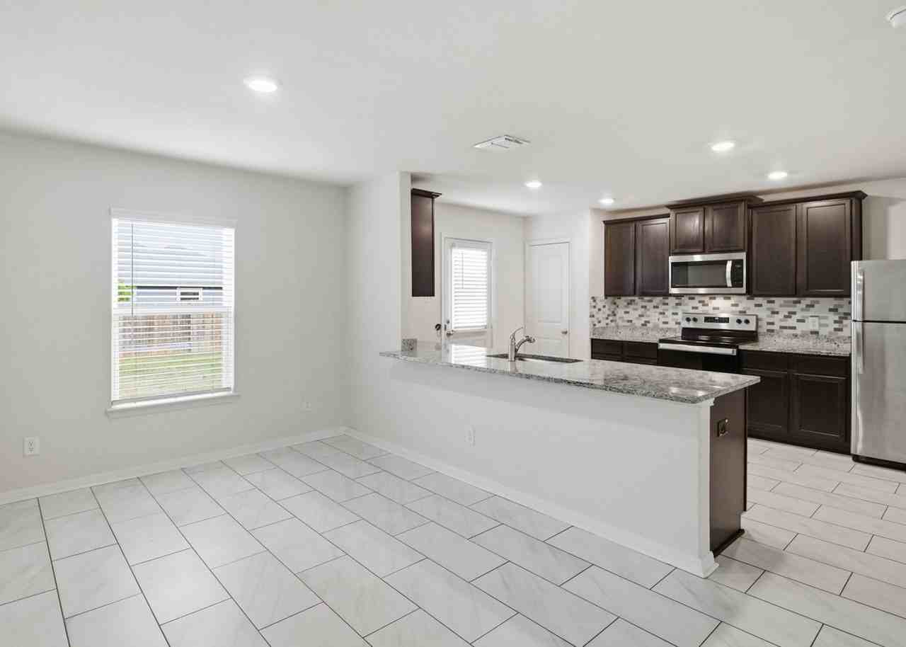 11848 Davalos Ln - Photo 5 of 25