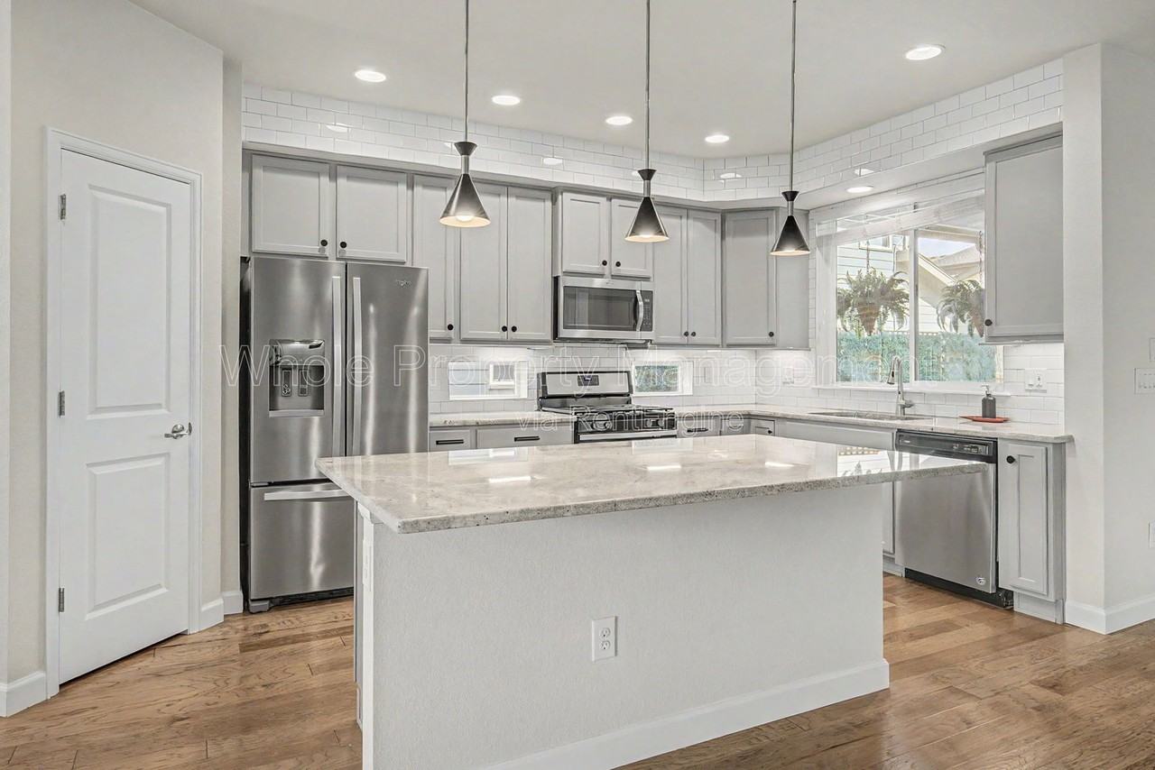 7255 W Evans Ave - Photo 5 of 34