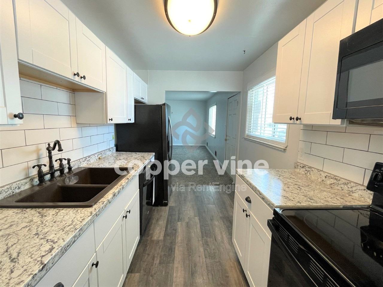 7115 Vrain St - Photo 5 of 17