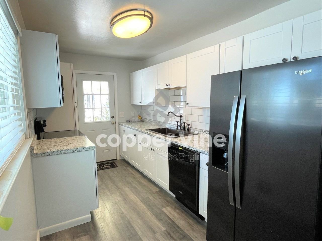 7115 Vrain St - Photo 6 of 17