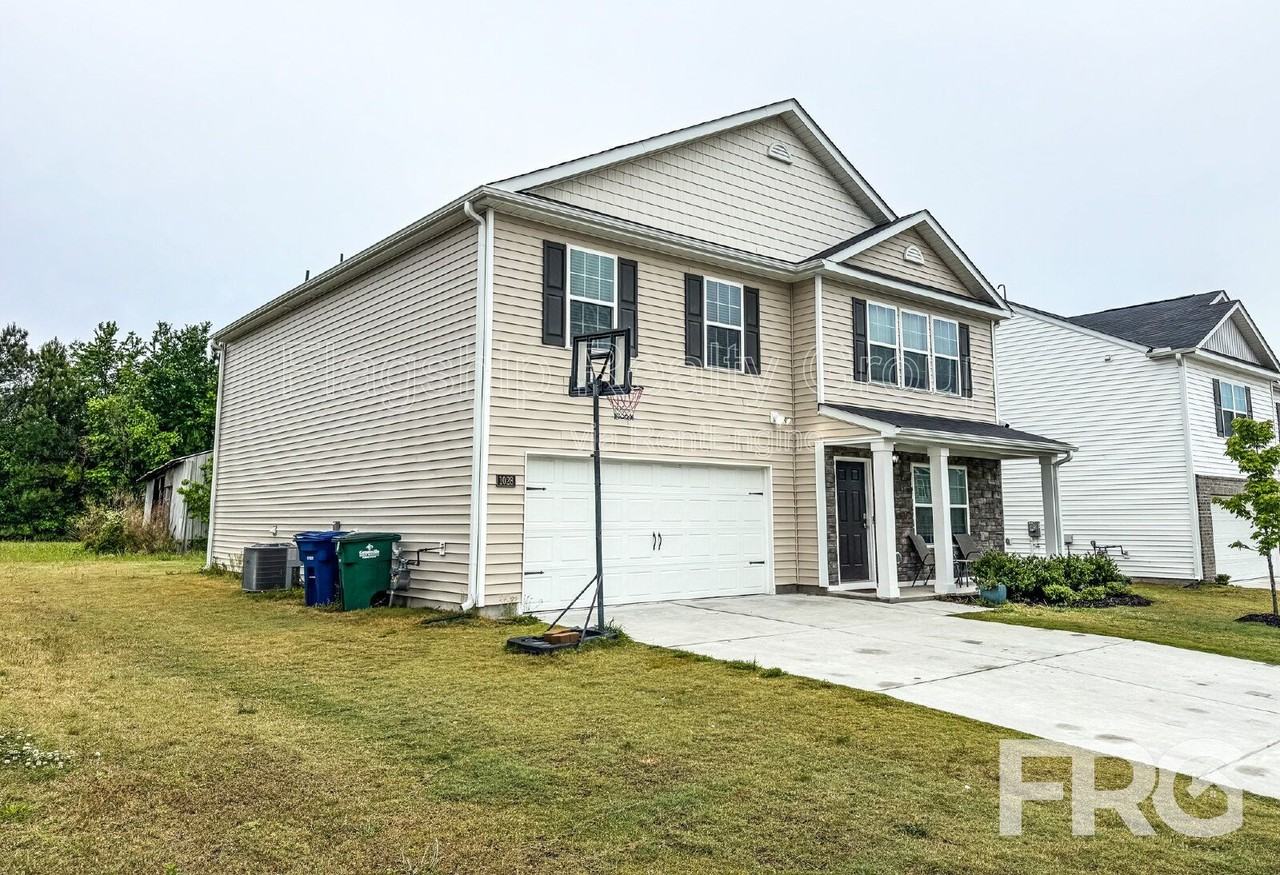 1028 Riverstone Dr - Photo 2 of 34