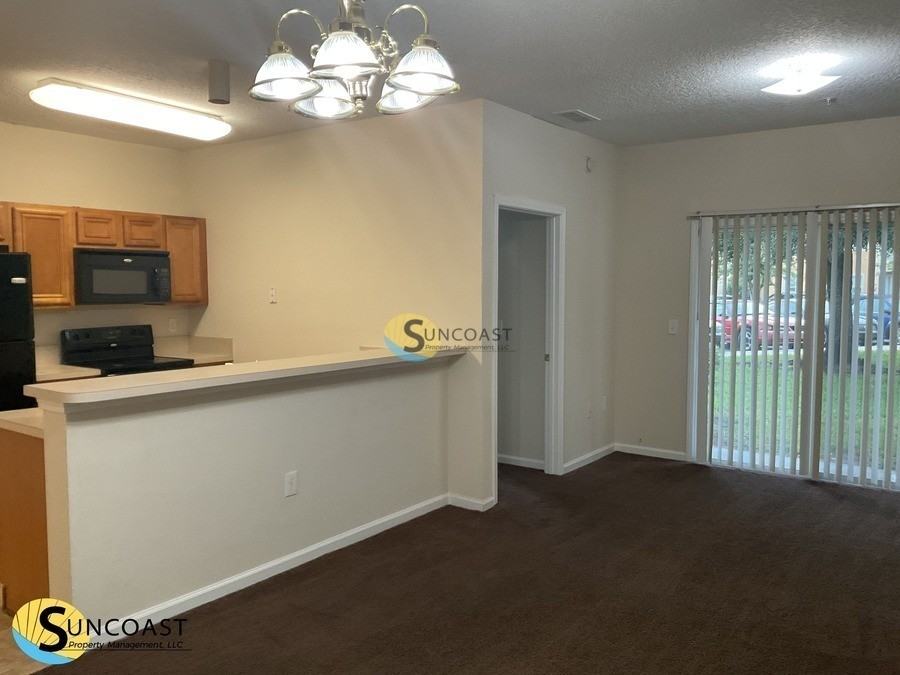 6985 Ortega Woods Dr #3 - Photo 3 of 17