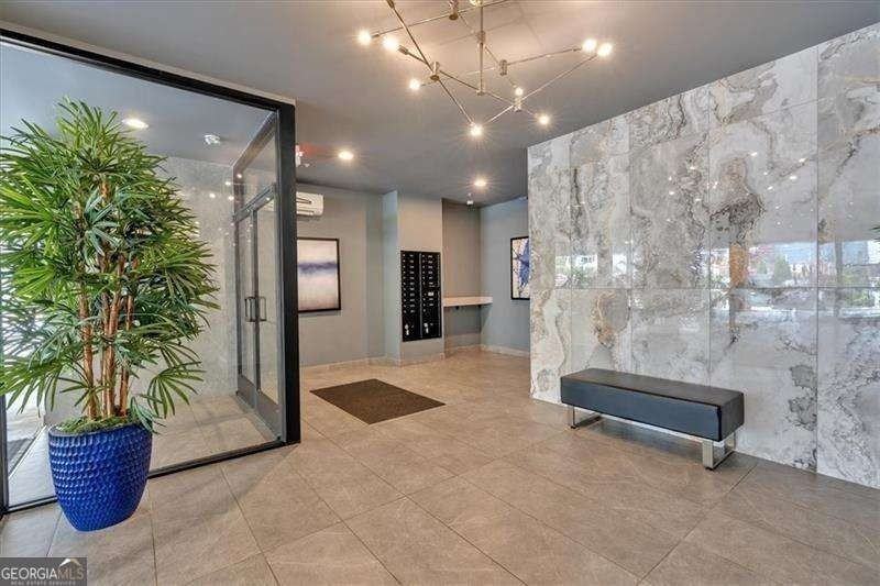 6890 Peachtree Dunwoody Rd #303 - Photo 3 of 31