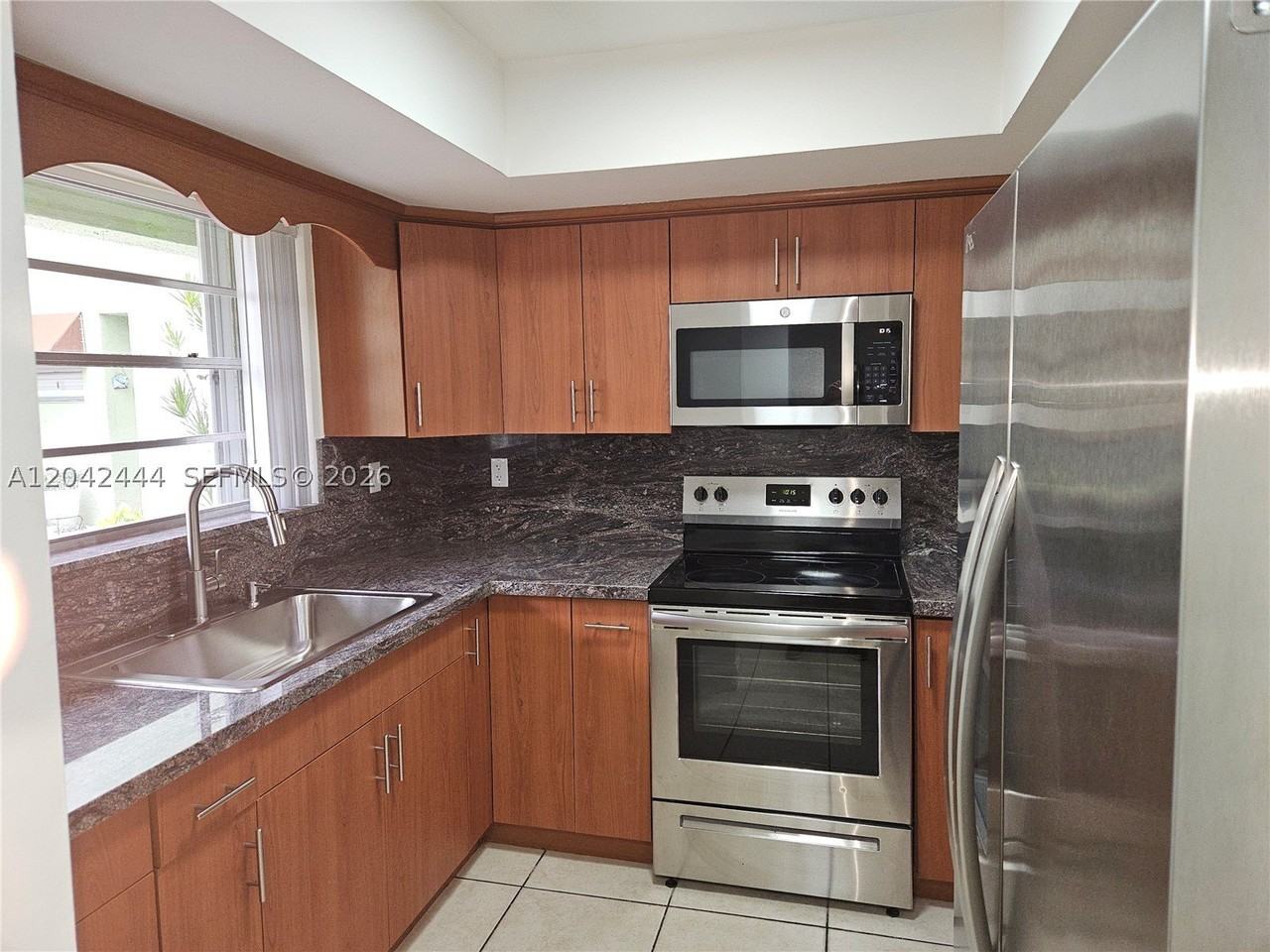 11071 Nw 7th St #104-15 - Photo 6 of 50
