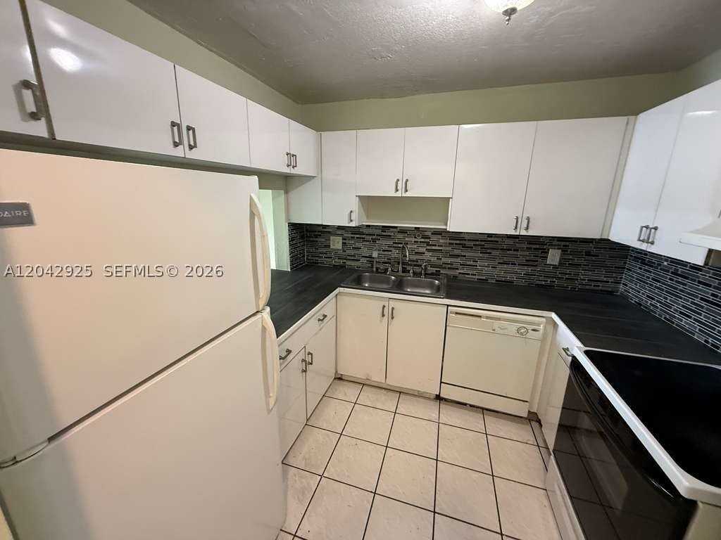 1900 W 68th St #G308 - Photo 2 of 8