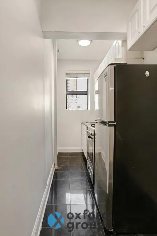 319 E 75th St - Photo 4 of 5