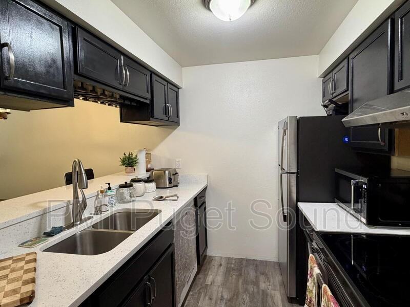 12600 57th Ave S #F203 - Photo 6 of 8