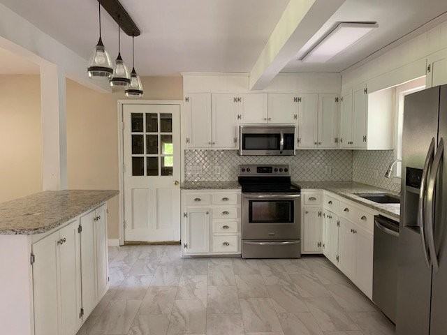 307 Maplewood Dr - Photo 4 of 18