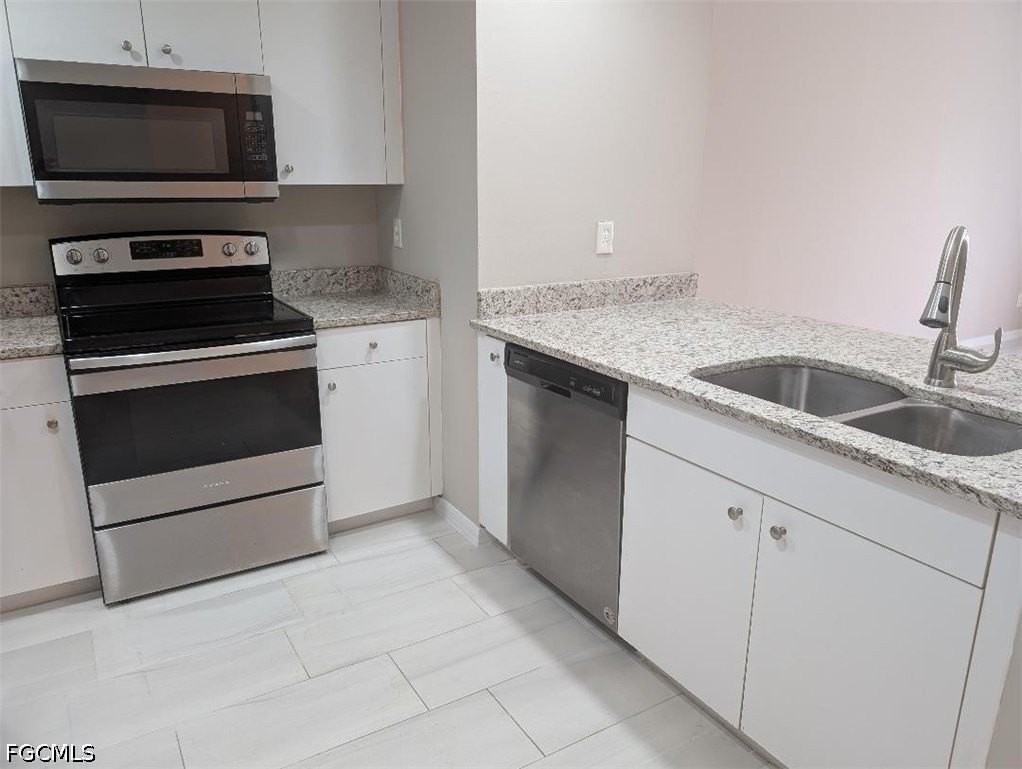 2933 Santa Barbara Blvd #101 - Photo 3 of 14