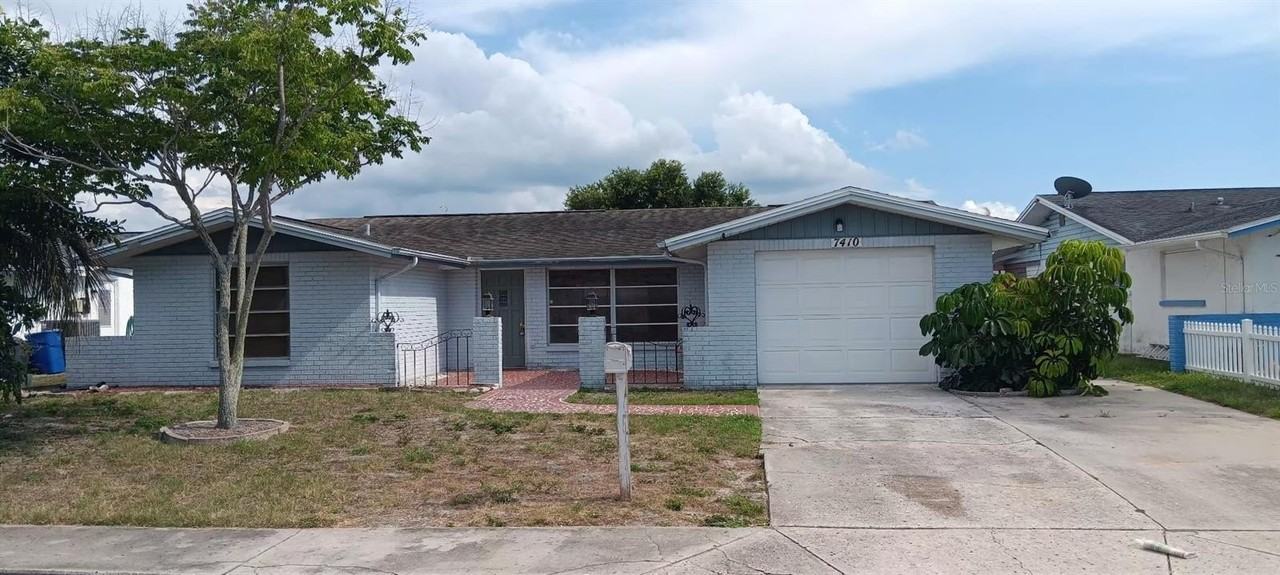 7410 Moravian Dr - Photo 2 of 32