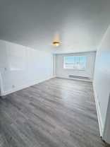 Two Bedrooms, One Bedroom, and Studio Apartments Available - Photo 1 of 1