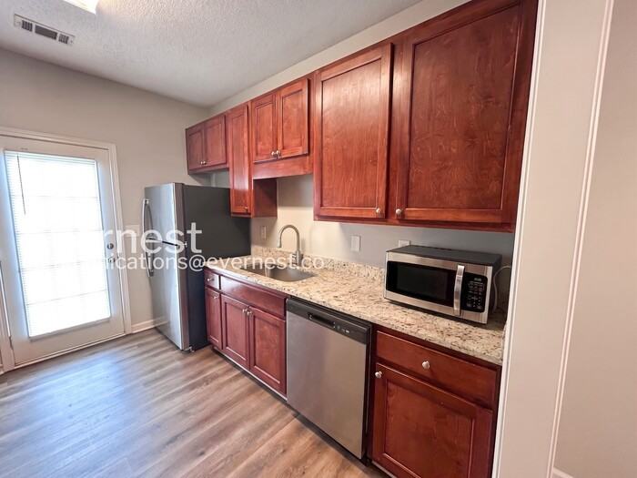 8648 Thomas Ln - Photo 6 of 23