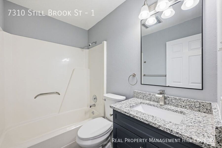 7310 Still Brook St #1 - Photo 3 of 33