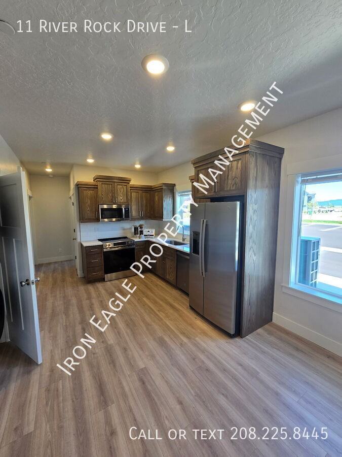 11 River Rock Drive - L - Photo 2 of 10