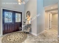 166 Woodcreek Dr N - Photo 2 of 31