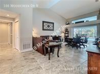 166 Woodcreek Dr N - Photo 4 of 31