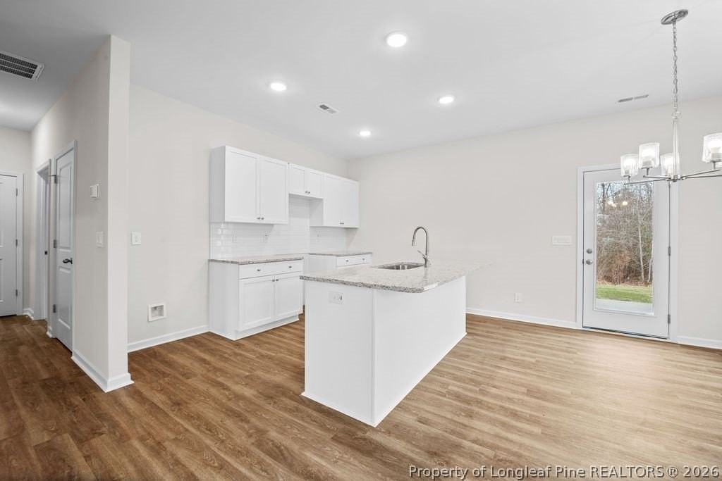 166 Brickendon Ln - Photo 7 of 26