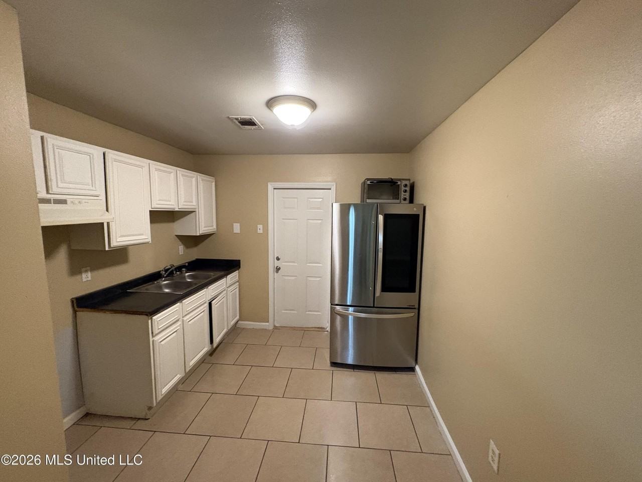 6525 Jasmine St Apt 6 - Photo 4 of 8