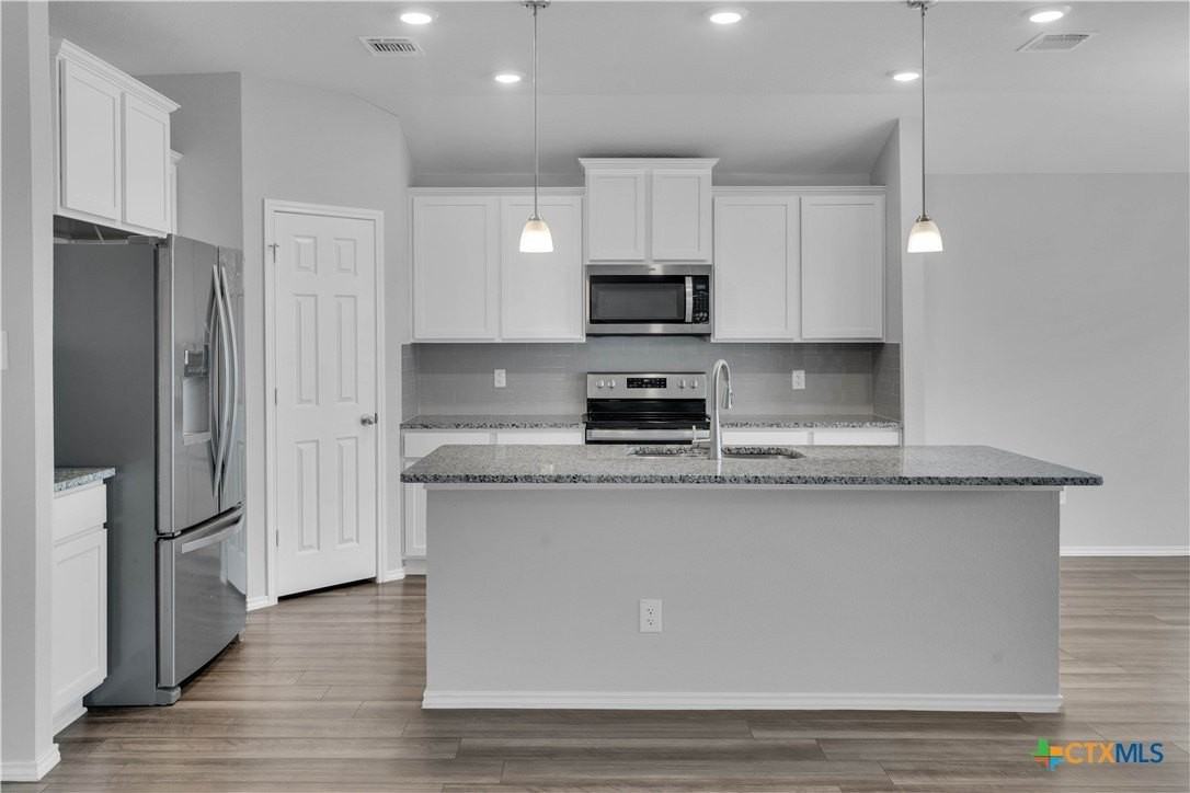 1303 Prospector Trl - Photo 2 of 31