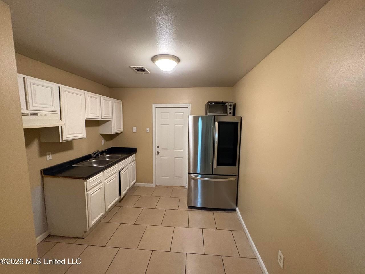 6525 Jasmine St - Photo 4 of 8