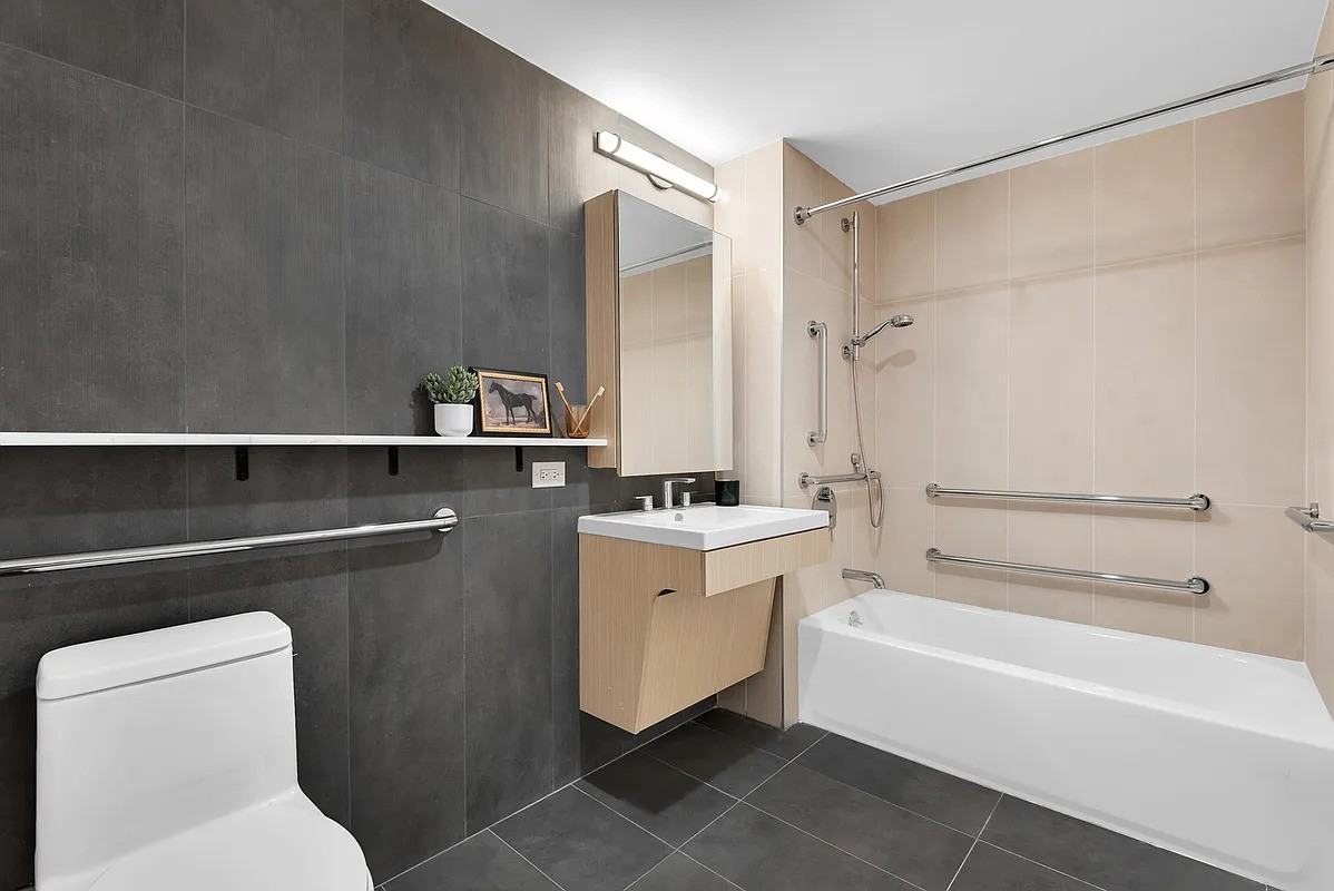 9881 Queens Blvd - Photo 2 of 5