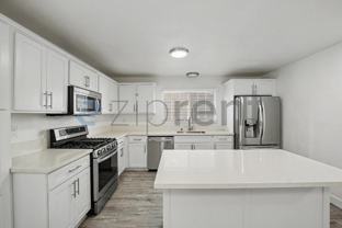927 Freeman Ave - Photo 1 of 1