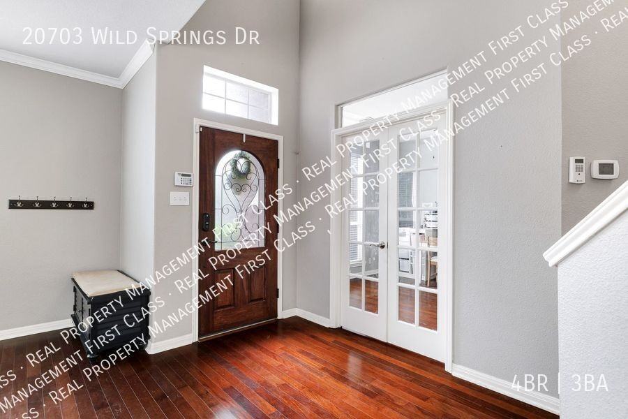 20703 Wild Springs Dr - Photo 4 of 32