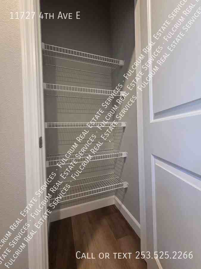 11727 4th Ave E - Photo 5 of 25