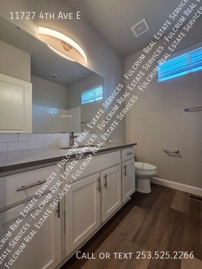 11727 4th Ave E - Photo 6 of 25