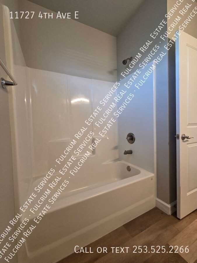 11727 4th Ave E - Photo 7 of 25
