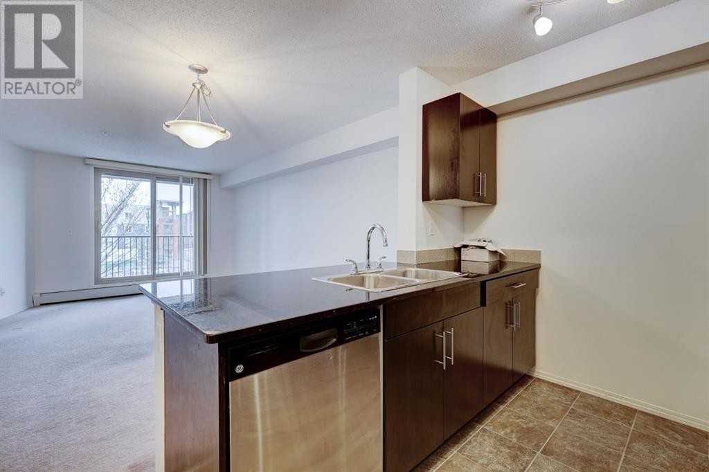 7210 - 403 Mackenzie Way Southwest - Photo 5 of 26