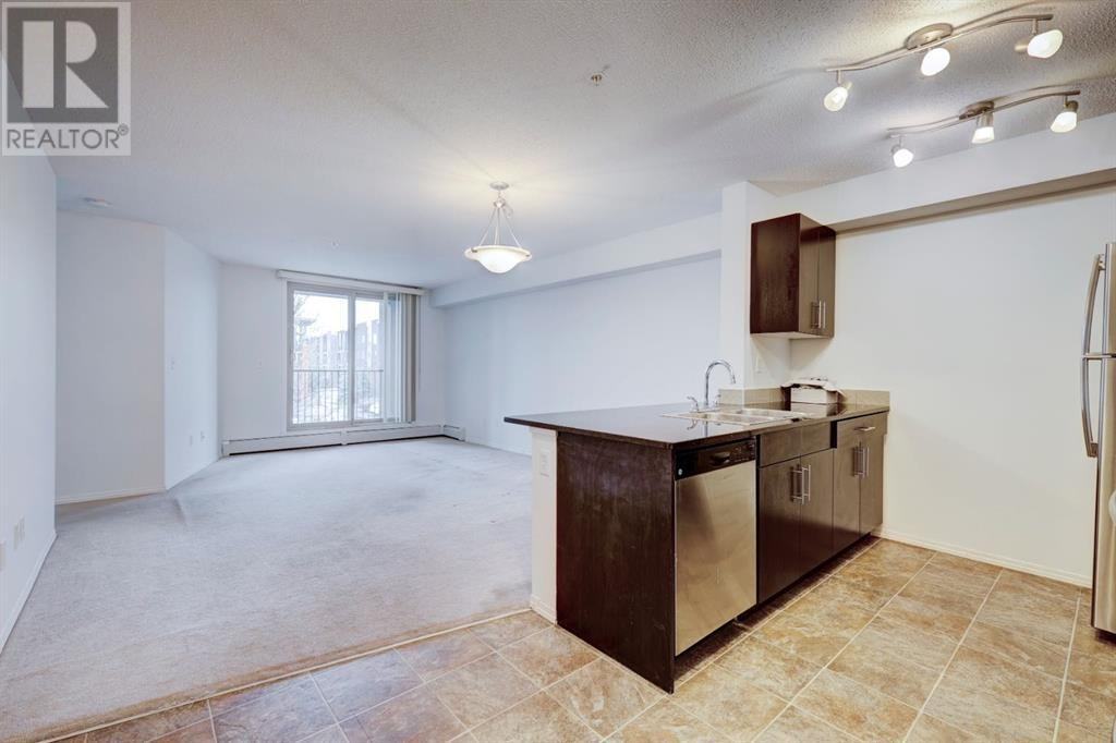 7210 - 403 Mackenzie Way Southwest - Photo 6 of 26