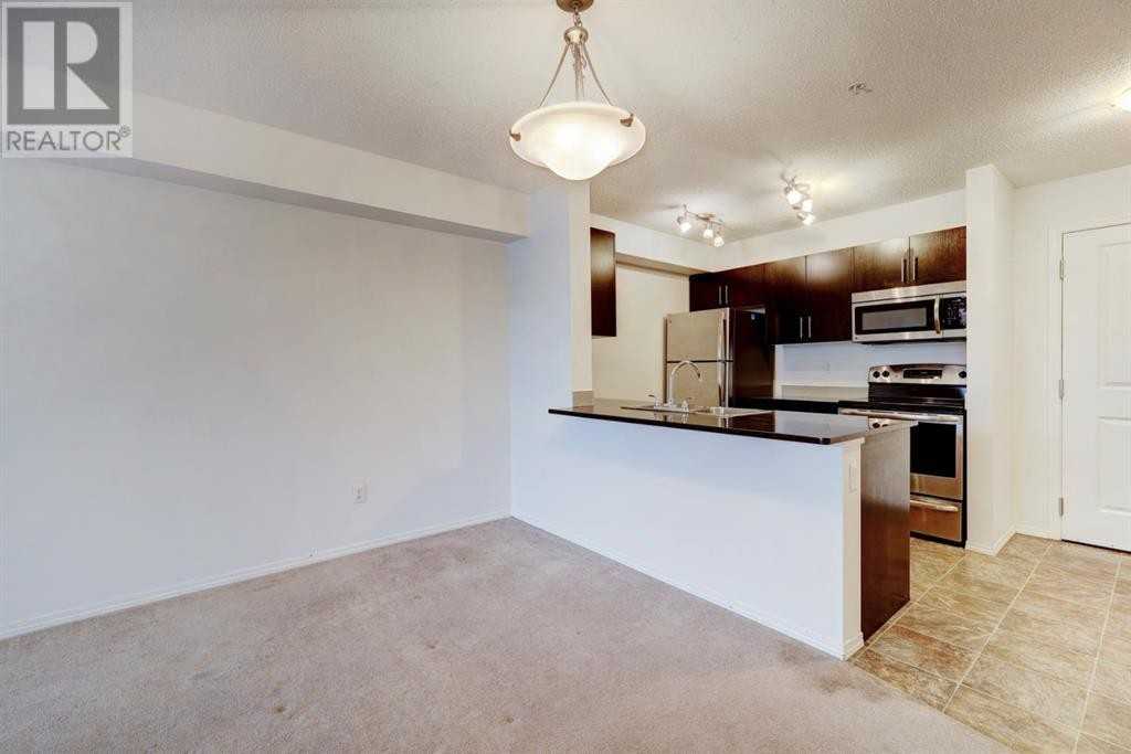 7210 - 403 Mackenzie Way Southwest - Photo 7 of 26