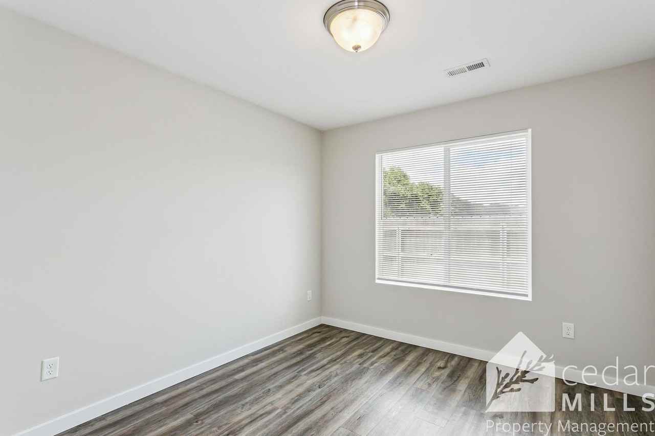 1907 E 69th Ct N - Photo 6 of 12