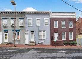 featured image of 13 W All Saints St