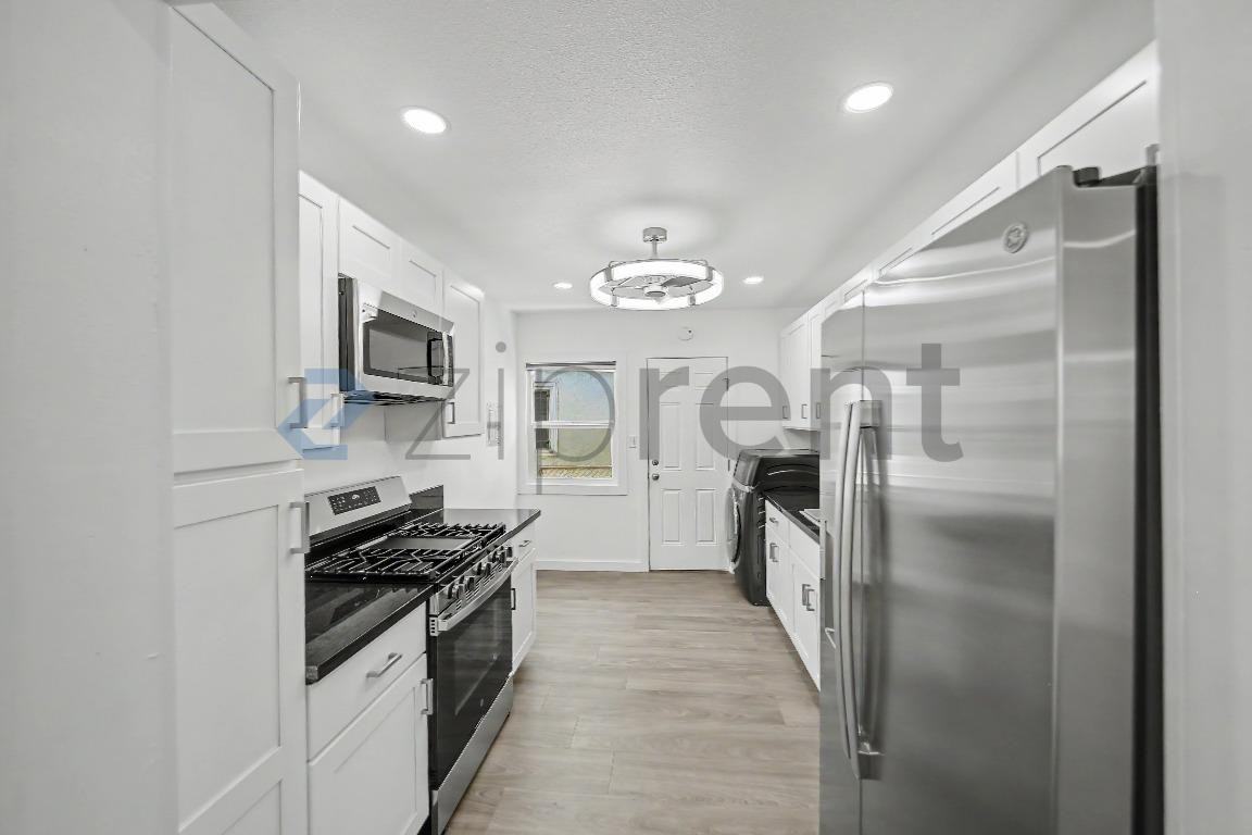 10907 S Burl Ave - Photo 6 of 13