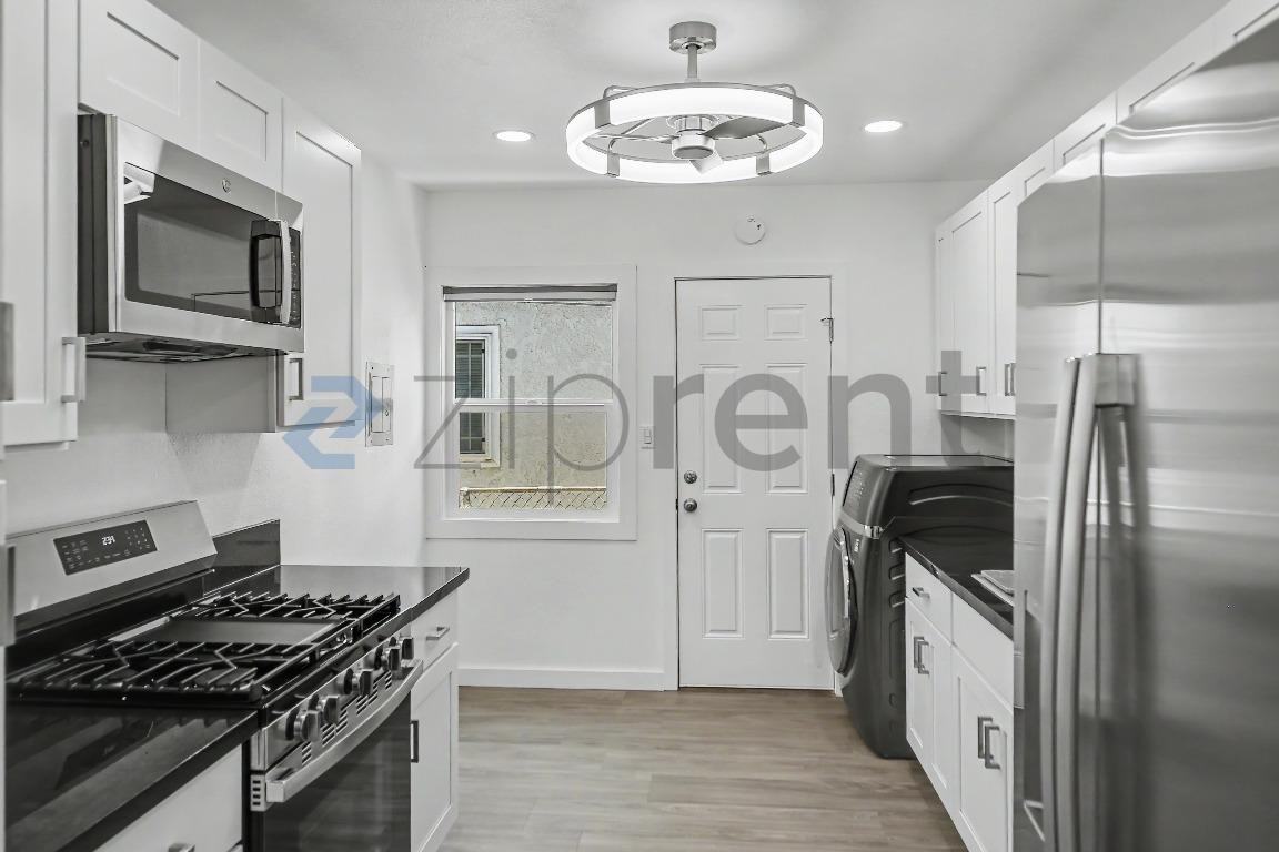 10907 S Burl Ave - Photo 7 of 13