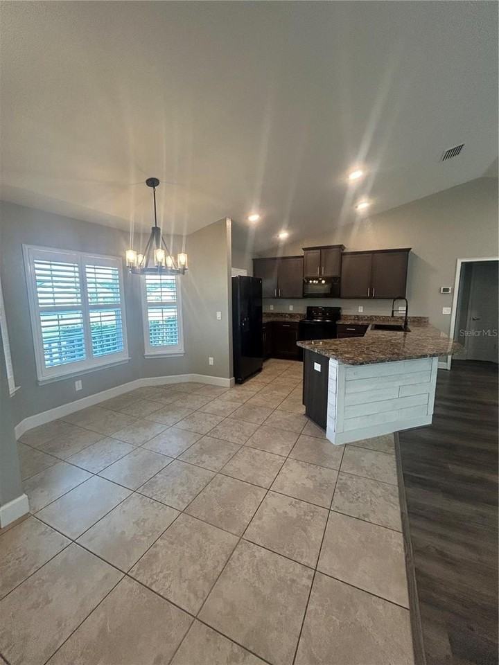 9155 Se 47th Court Rd - Photo 3 of 16