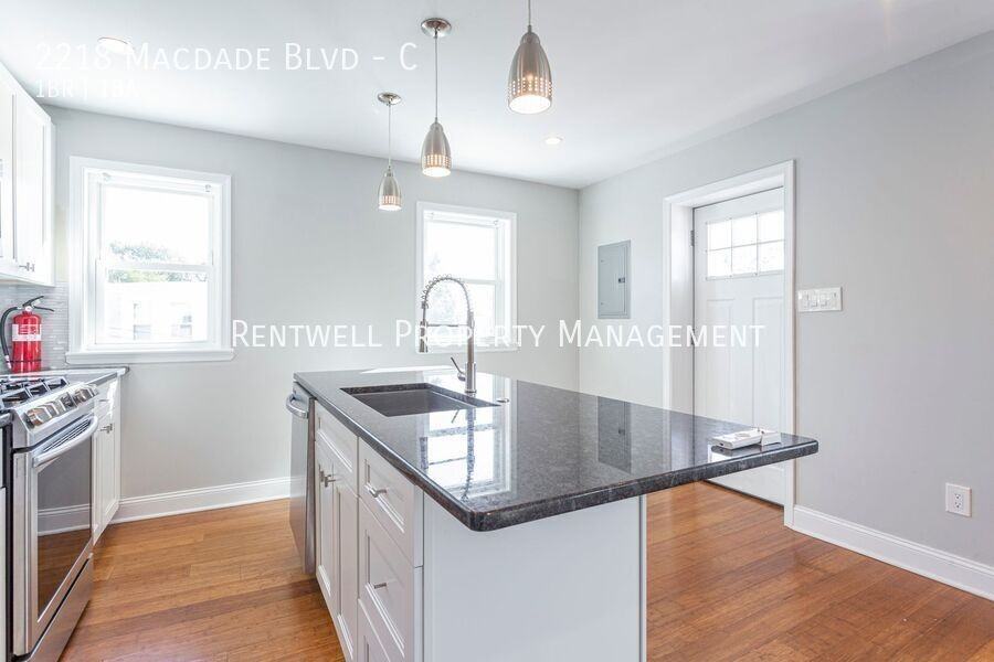 2218 Macdade Blvd #C - Photo 4 of 33