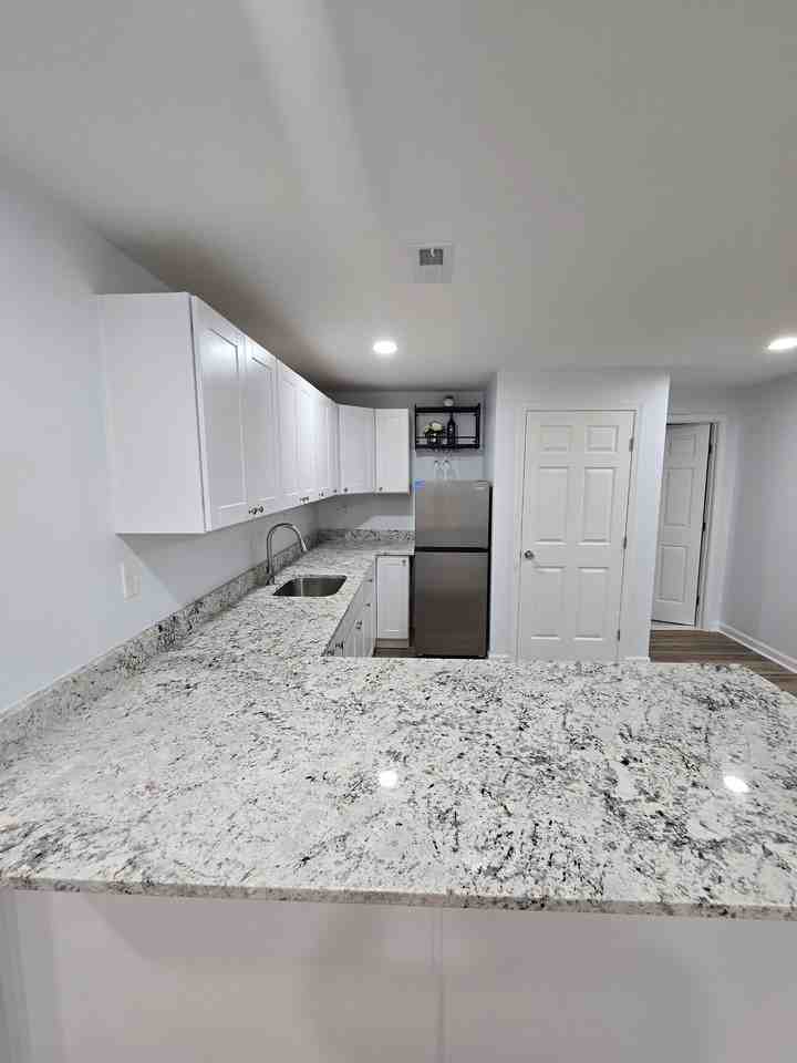 9437 Flowerden Ln #1stFL - Photo 4 of 18